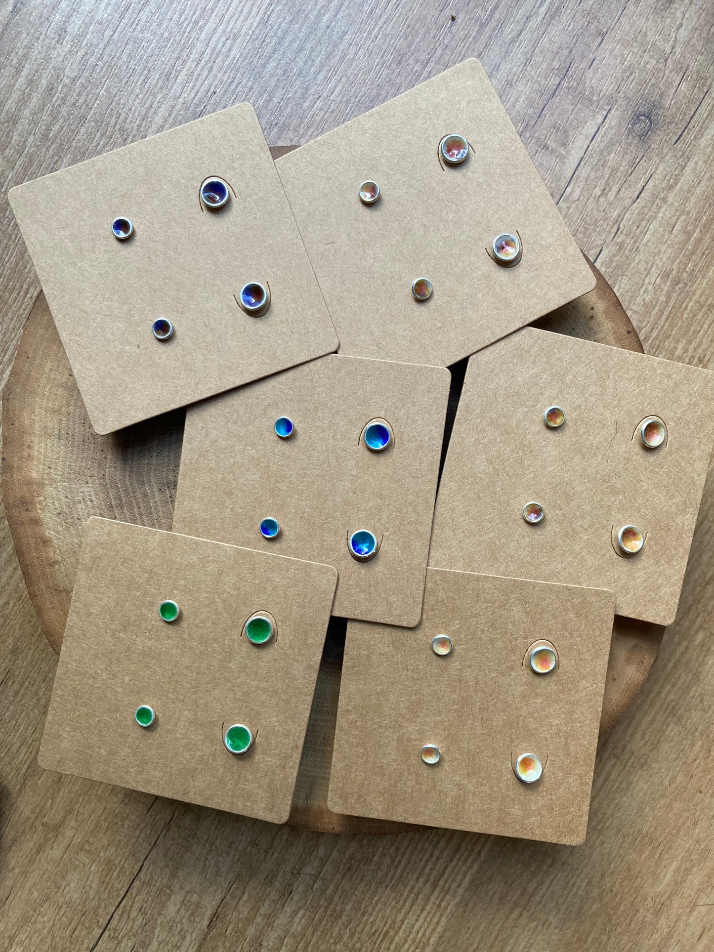 Geëmailleerde oorstekers - set